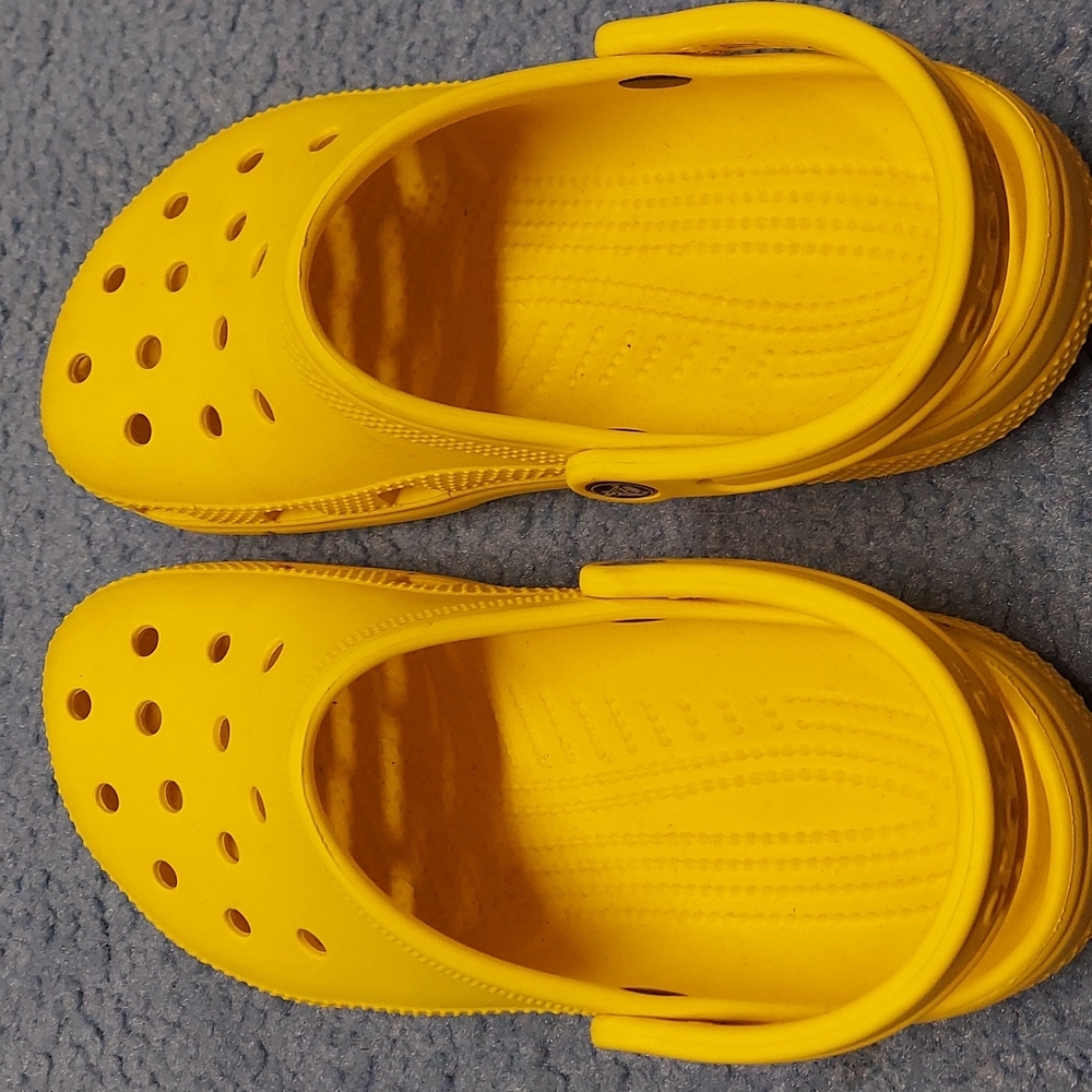 Bright yellow crocs